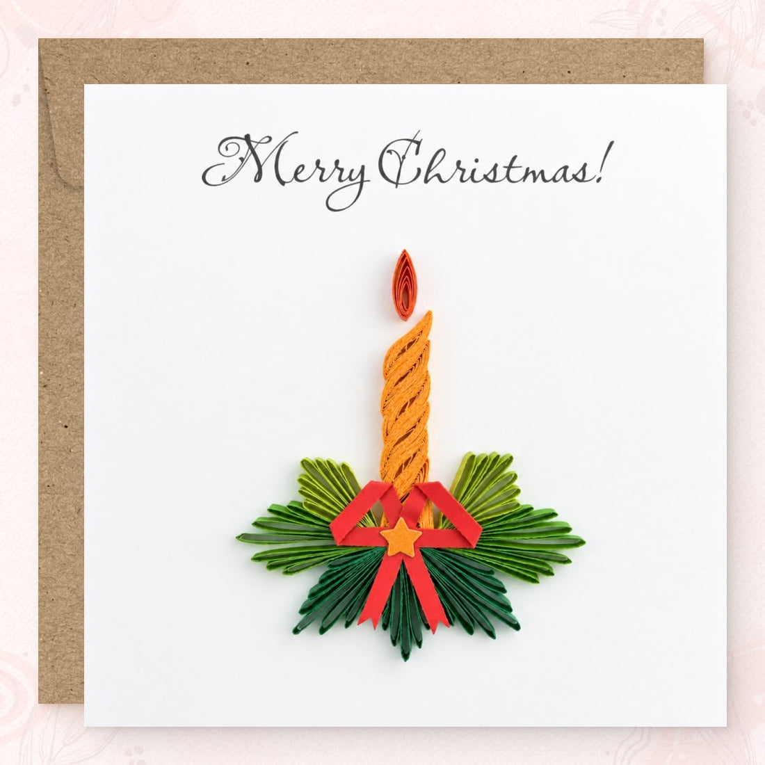 Quilled Christmas card with a gold paper candle, orange flame, green pine, and a red bow.