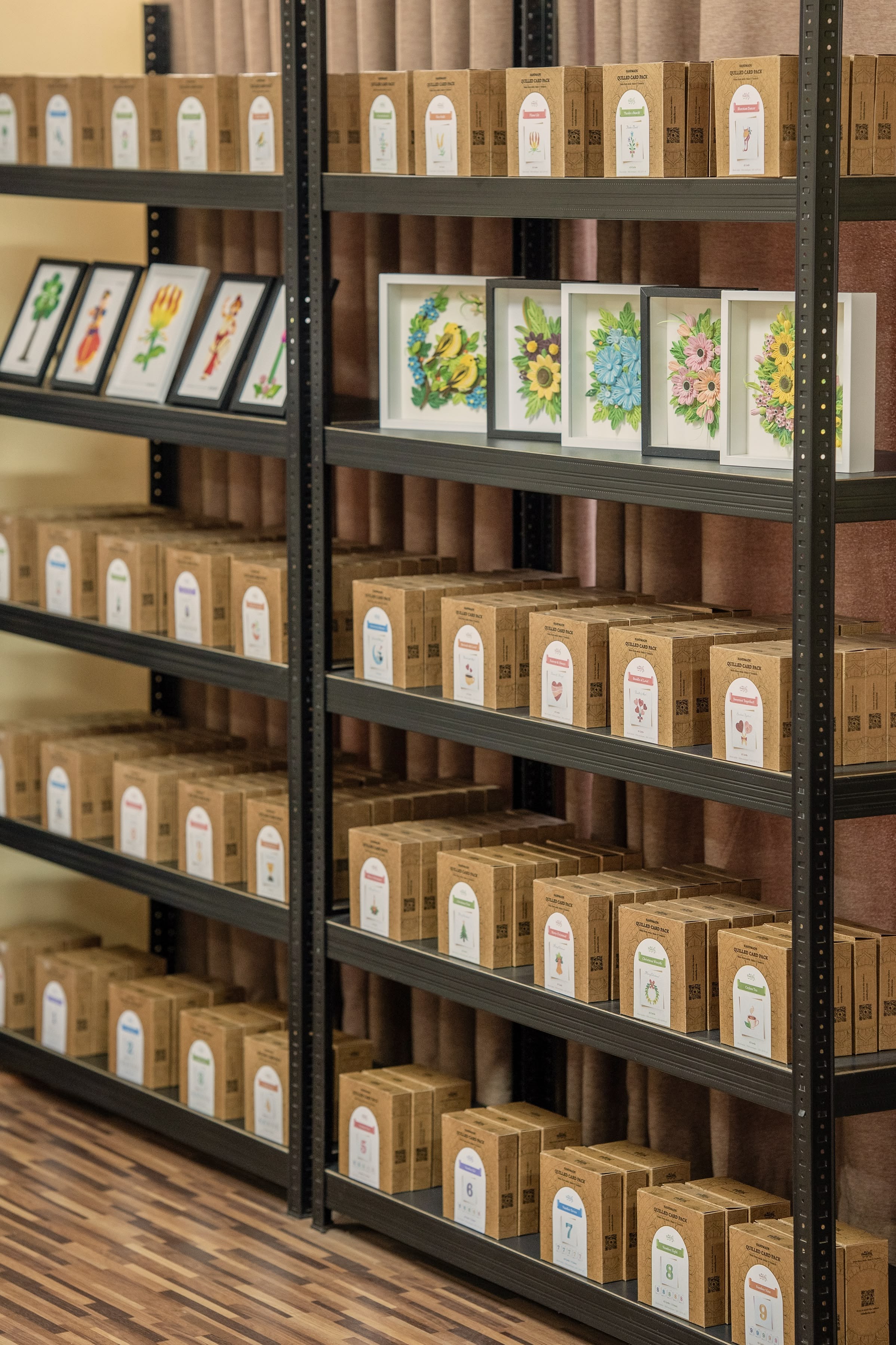 Vonderly kraft box quilled card packs organized by design on studio shelves in Jaffna, Sri Lanka