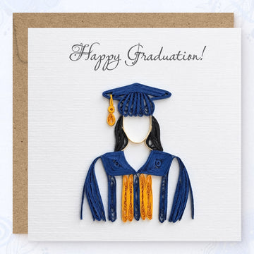 Quilled graduation card with a figure in a navy cap and gown and a gold stole under gray script.