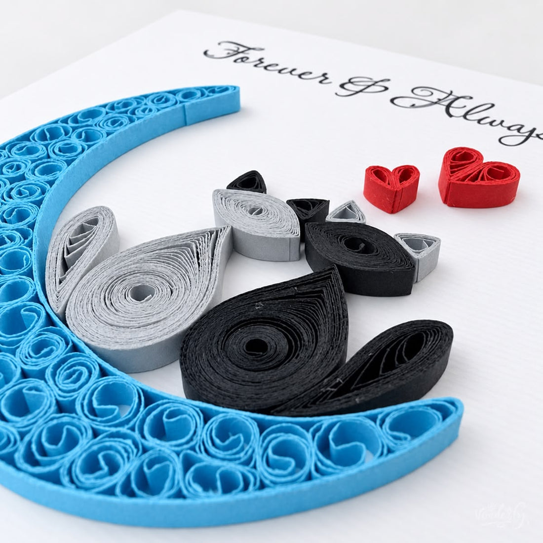 Moon Cats quilled greeting card with two cats, a blue crescent and red hearts beneath the printed Forever & Always wish.