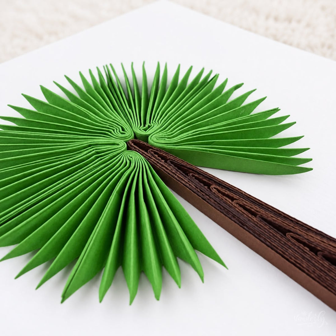 Palmyrah Palm quilled greeting card with a green paper fan crown, dark brown trunk, and two tan sand mounds.