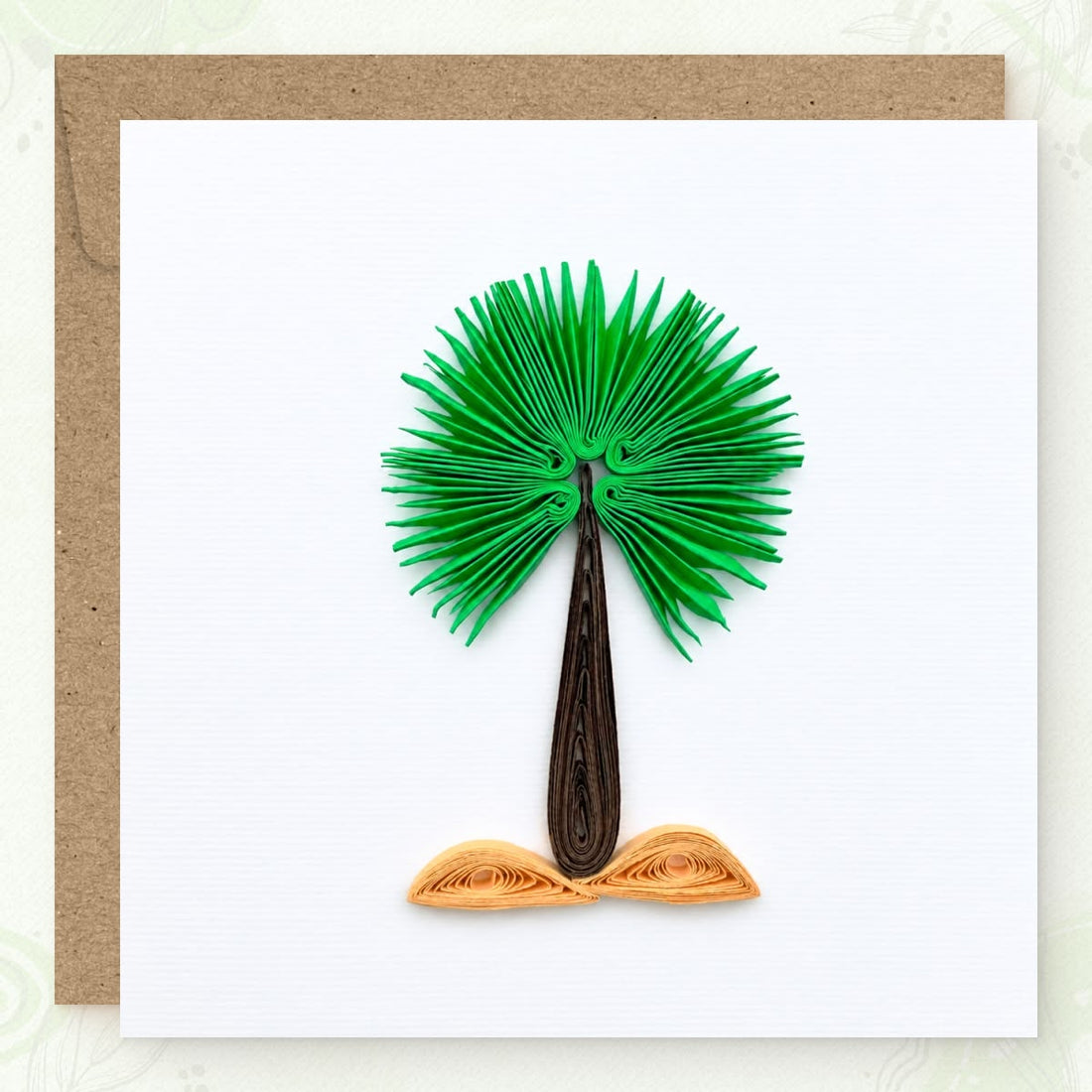 Palmyrah Palm quilled greeting card with a green paper fan crown, dark brown trunk, and two tan sand mounds.