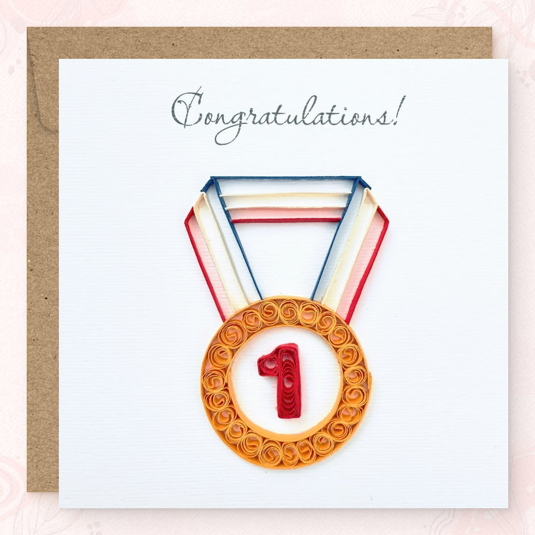 Handmade quilled congratulations greeting card with a gold first-place medal and number 1 hanging on a multi-colored ribbon, "Congratulations" printed in calligraphic script, paper art by Vonderly