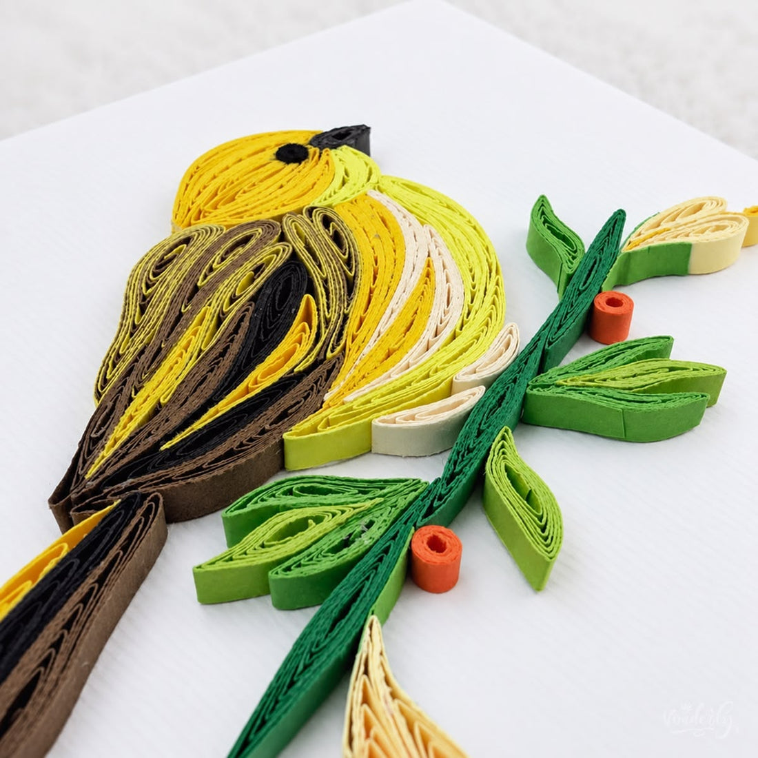 Yellow Warbler quilled greeting card with a yellow songbird on a green branch with orange berries and pale buds.